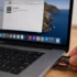 Show an SD card being inserted into a MacBook Pro's built-in slot